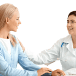 "Woman doctor attending to her patient during Mental Health Awareness Month", or "Mental health professional providing care to her patient during Mental Health Awareness Month".